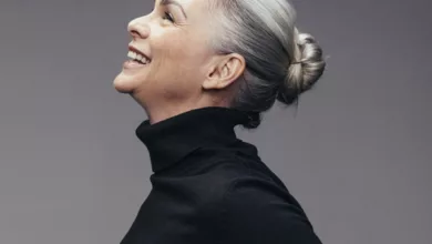 To Go Gray or Not 17 Woman with Gray Hair Smiling