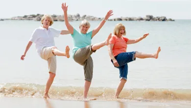 Age is a Number, Youth is a Mindset 15 Three Aging Women Acting Youthful at the Water’s Edge
