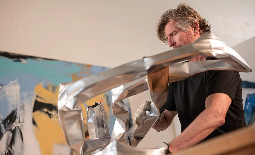 Tom Hoitsma Shaping Aluminum into Works of Art