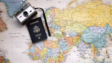 What Happens If You Have a Medical Emergency Abroad? 7 Map of Countries Abroad, Camera, and Passport