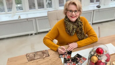 Why “I Will Follow Him” Still Follows Peggy March—60 Years Later 4 Peggy March smiling at the camera while signing an autograph.