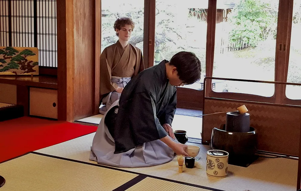 Travel Well, Travel Smart: A 50+ Globetrotter’s Journey Through Japan 3 A traditional Japanese tea ceremony in progress—quiet, intentional, and rich with centuries-old ritual.