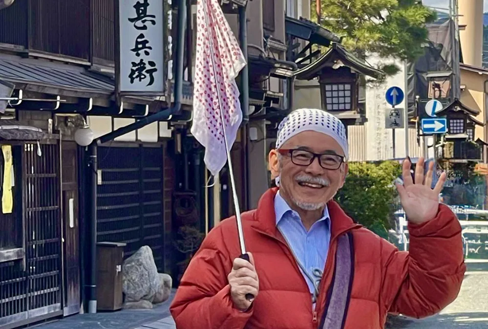 Travel Well, Travel Smart: A 50+ Globetrotter’s Journey Through Japan 2 Our tour leader, Aki Hiratsuka, guides the group through a memorable stop on our cultural journey across Japan.