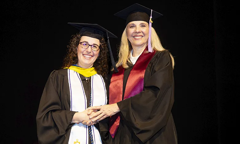 It’s Never Too Late: 58-Year-Old Mom Earns Her Degree 1 Cristina Flores-Villarreal, 58, on the right, in cap and gown, celebrates her graduation from Texas A&M College of Dentistry alongside Professor Maureen Brown.