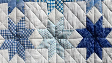 4 Creative Techniques for Unique Quilting Patterns 25 Blue and white star quilt blocks showing mixed patterns in the same color family for a unique quilt design.