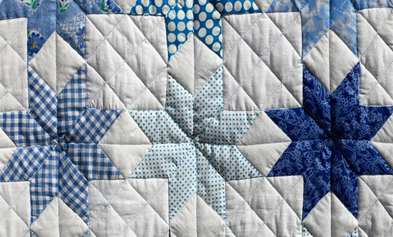 4 Creative Techniques for Unique Quilting Patterns 1 Blue and white star quilt blocks showing mixed patterns in the same color family for a unique quilt design.