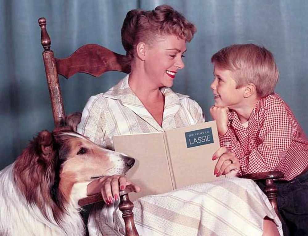 June Lockhart at 100 5 June Lockhart in her iconic role as the caring mother in the Lassie TV series, sitting with the famous collie and Jon Provost as Timmy.