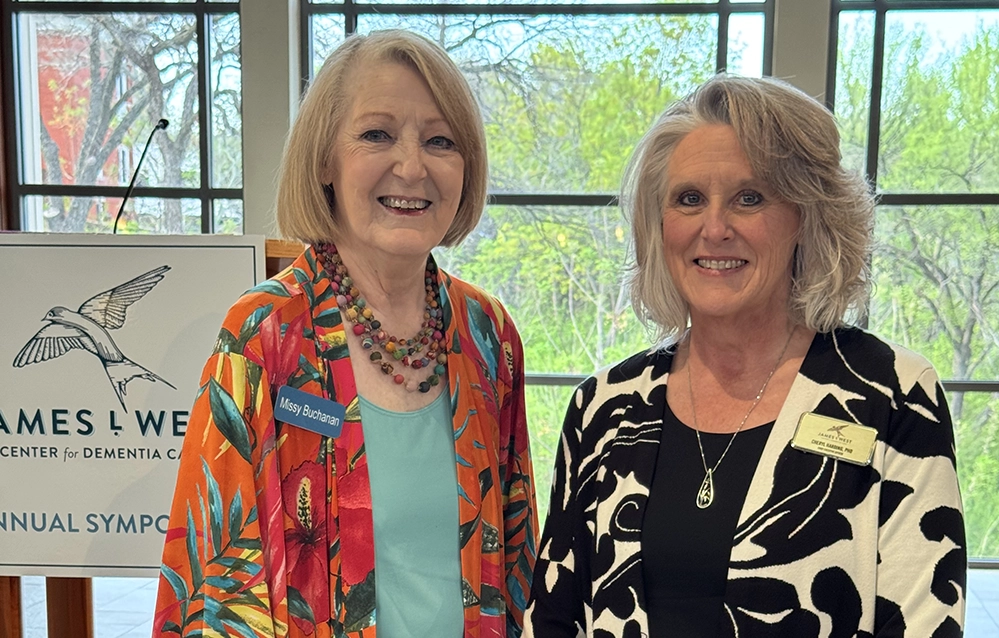 How Faith and Spirituality Help Families Navigate Dementia 3 Speaker Missy Buchanan and Cheryl Harding share a moment at the James L. West Dementia Care Symposium.