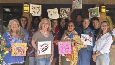 Breast Cancer Survivors Exhibition 5 Group of breast cancer survivors and local Dallas artists holding original art pieces created in a therapeutic retreat at Rachel Larlee Studio.