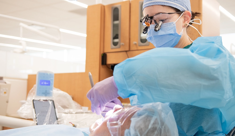 Senior Dental Care 2 Dentist examining a senior patient in a modern dental office during routine checkup