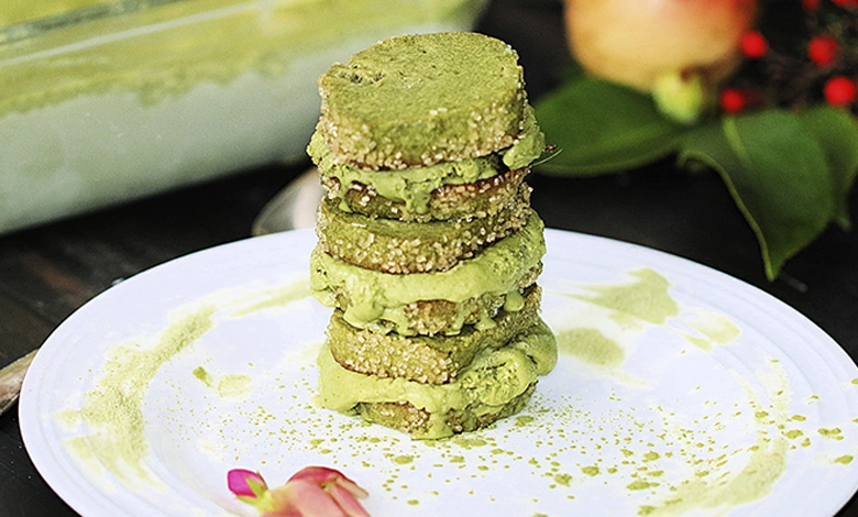 Matcha Ice Cream Cookie Sandwiches 1 Stack of homemade matcha ice cream sandwiches with green tea ice cream between vanilla cookies on a white plate