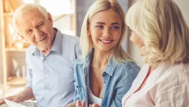 Elderly parents and adult daughter having a warm conversation about estate planning