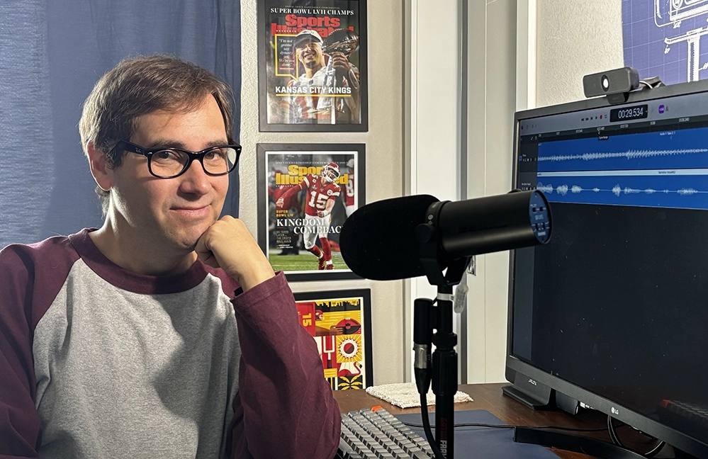 Turning Passion Into Purpose After 50: 3 creatives living their dream 6 Jack Pointer recording Funbunker Mixtape comedy podcast with headphones and microphone in home studio