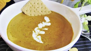 Savory-Sweet Pumpkin Pie Soup 3 Bowl of creamy pumpkin pie soup topped with a swirl of cream and cookie crumbles.