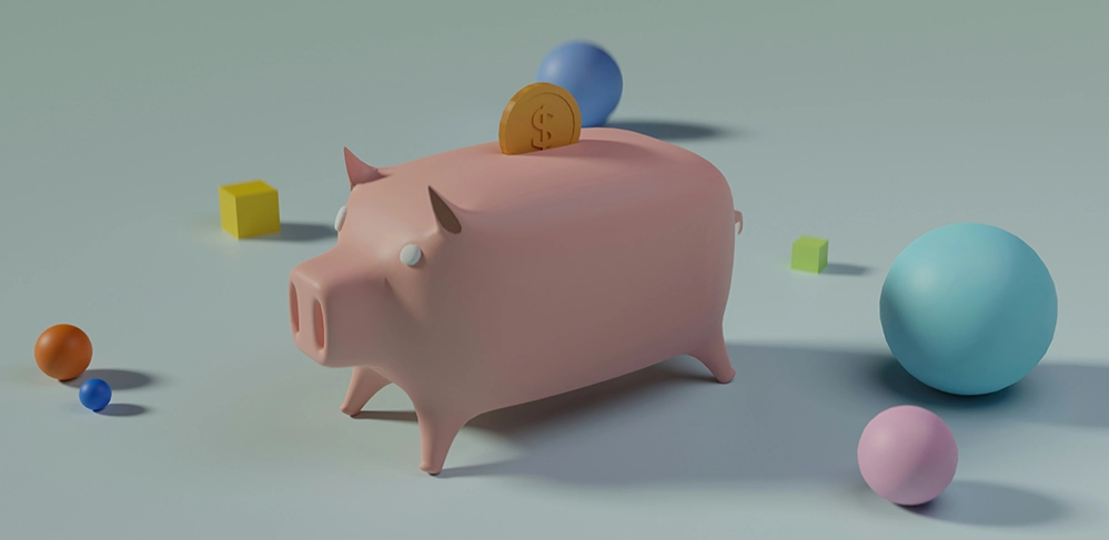 Pink piggy bank with a coin slot and colorful spheres around it, symbolizing savings, security, and 90 years of Social Security.