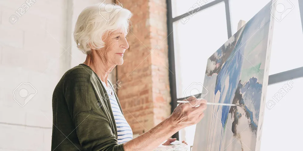 How to Support Brain Health 4 105037715 talented senior woman painting in art studio W