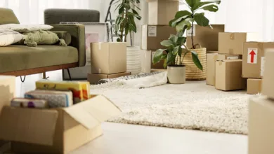 Moving After 50: Real-life tips and hacks for a successful move 27 Packed moving boxes in a room