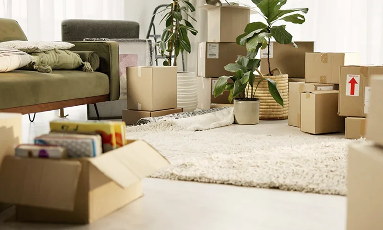 Moving After 50 1 Packed moving boxes in a room