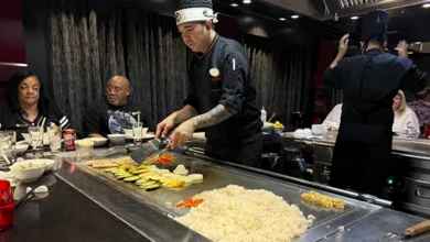 What is Specialty Dining on a Cruise? 5 Teppanyaki chef at Izumi, a specialty dining option on a Harmony of the Seas cruise