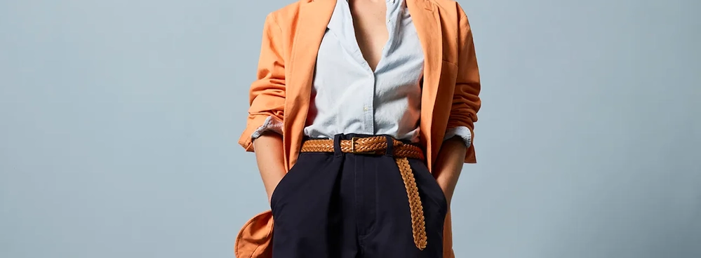 Woven leather belt adding polish to a relaxed blazer and trouser look