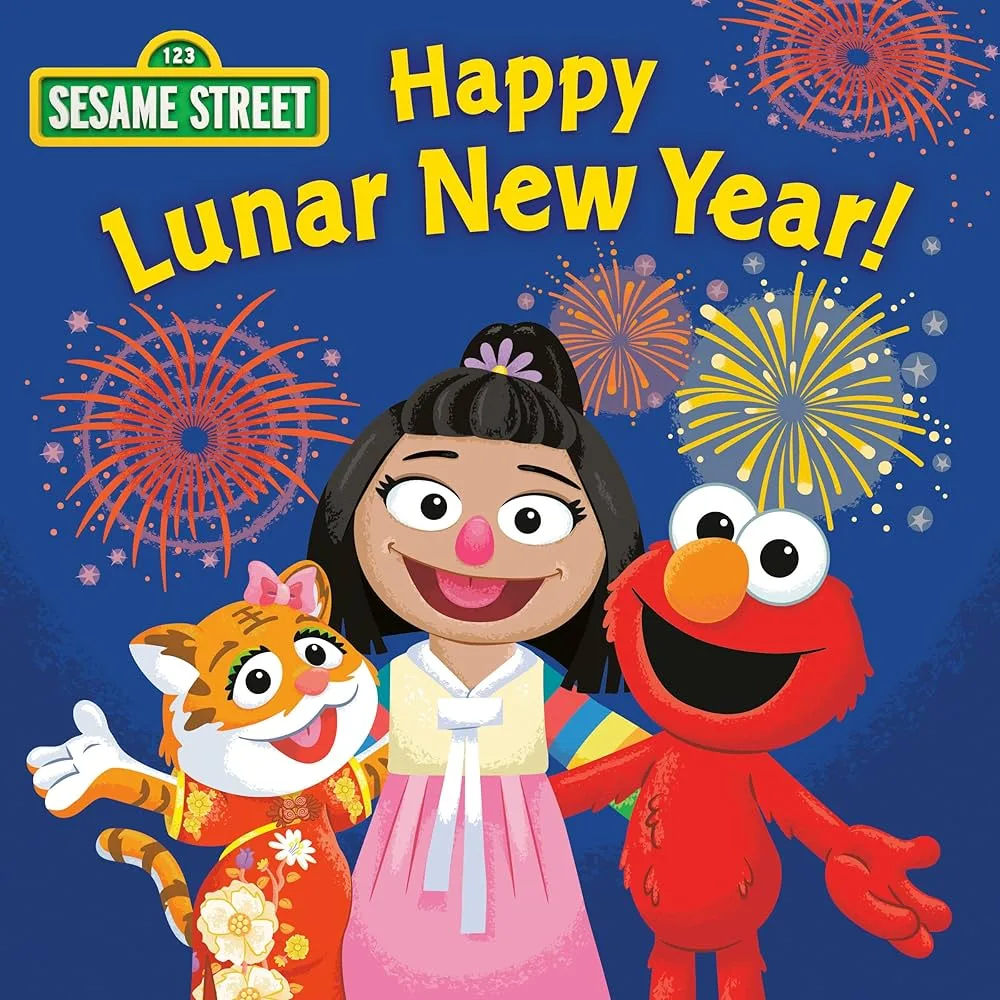 Cover of Happy Lunar New Year board book featuring Elmo, Ji-Young, and Lily the tiger with fireworks. 