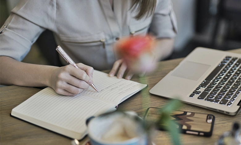 Journaling for stress — writing prompts in a notebook