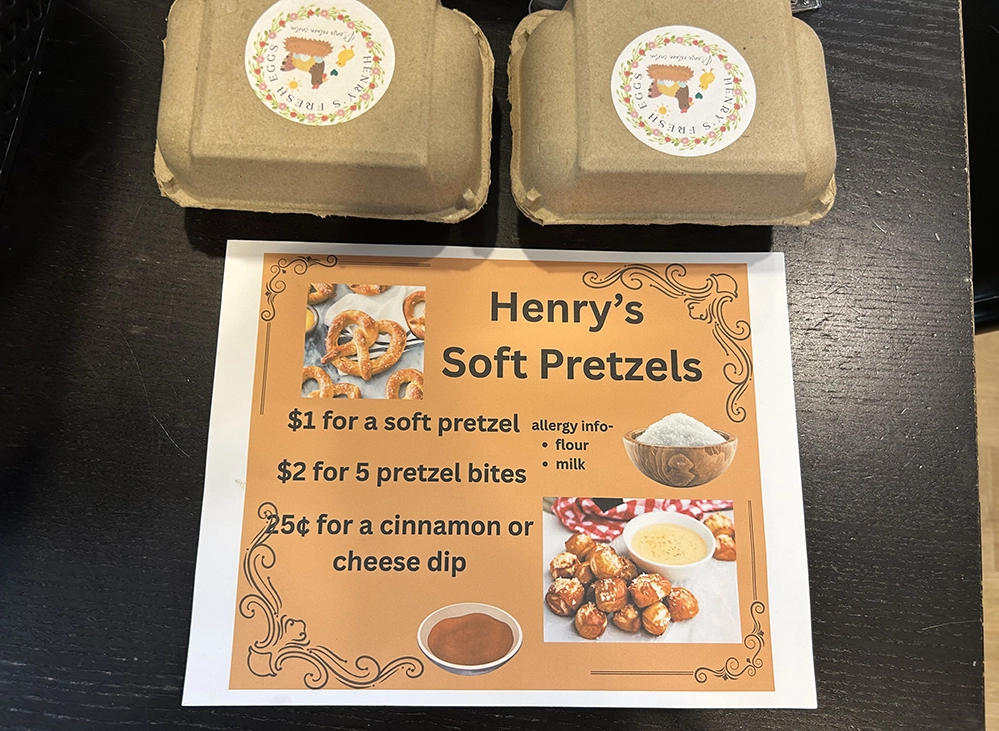 Henry’s Fresh Eggs branded cartons alongside Henry’s Soft Pretzels menu