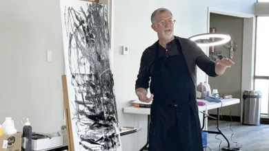 Artist CJ Miller leading a live Studio Reset creative session at an easel.