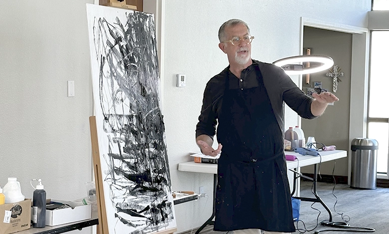 Artist CJ Miller leading a live Studio Reset creative session at an easel.