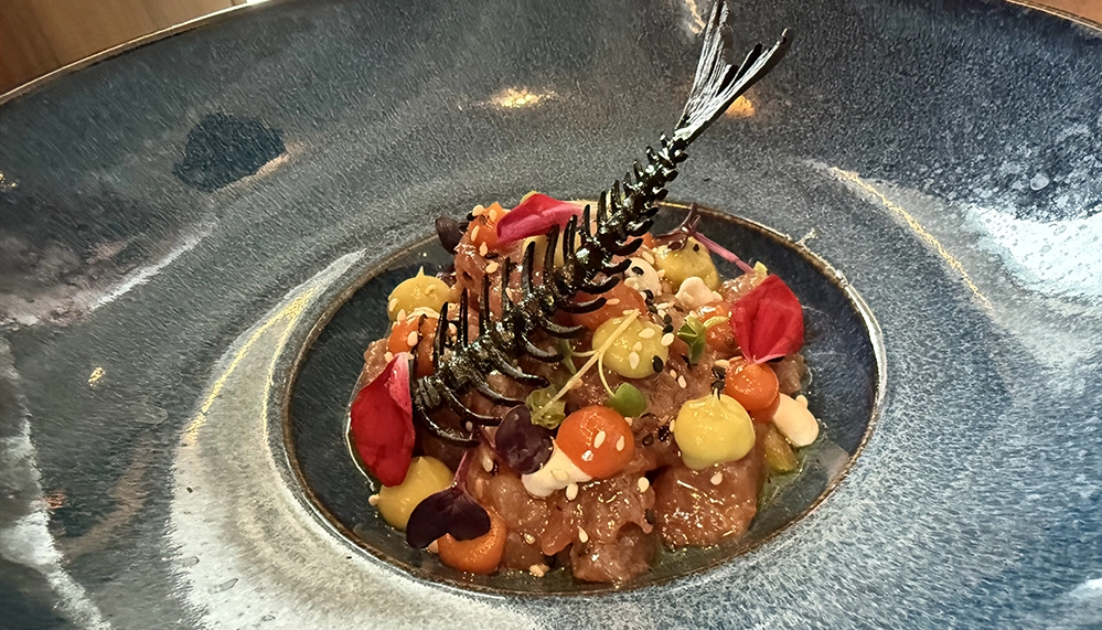 Think You Don't Like Cruises? You Might Just Be on the Wrong Ship 6 Tuna tartare plated with edible flowers at Basil and Bamboo aboard Star Legend