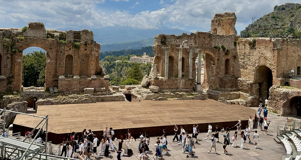 Think You Don't Like Cruises? You Might Just Be on the Wrong Ship 4 Ancient Greek Amphitheatre at Taormina, Sicily, with snow-capped Mount Etna in the distance